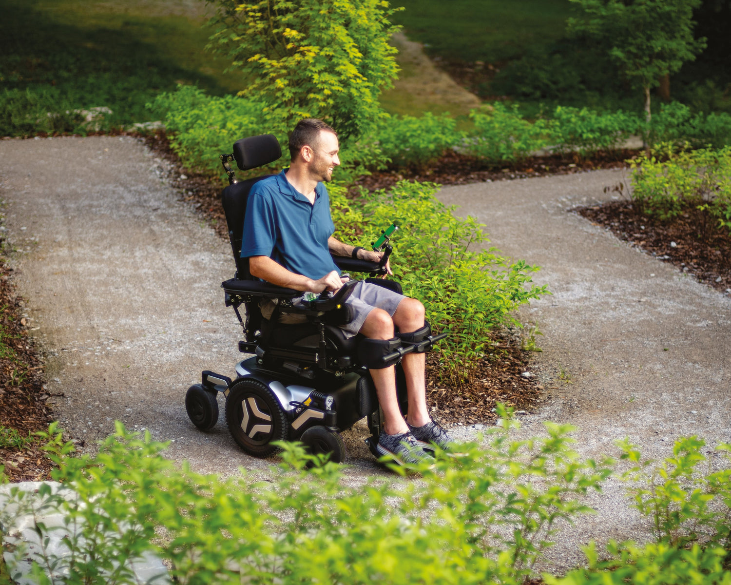 Man driving in M5 Corpus power wheelchair